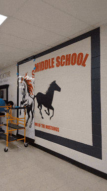 Timelapse of cafe mural being installed.