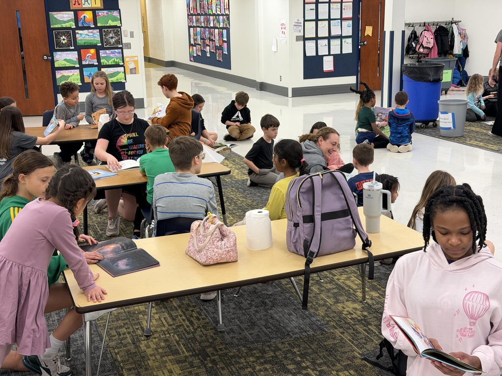 SMS Book Club reading to students at PSE