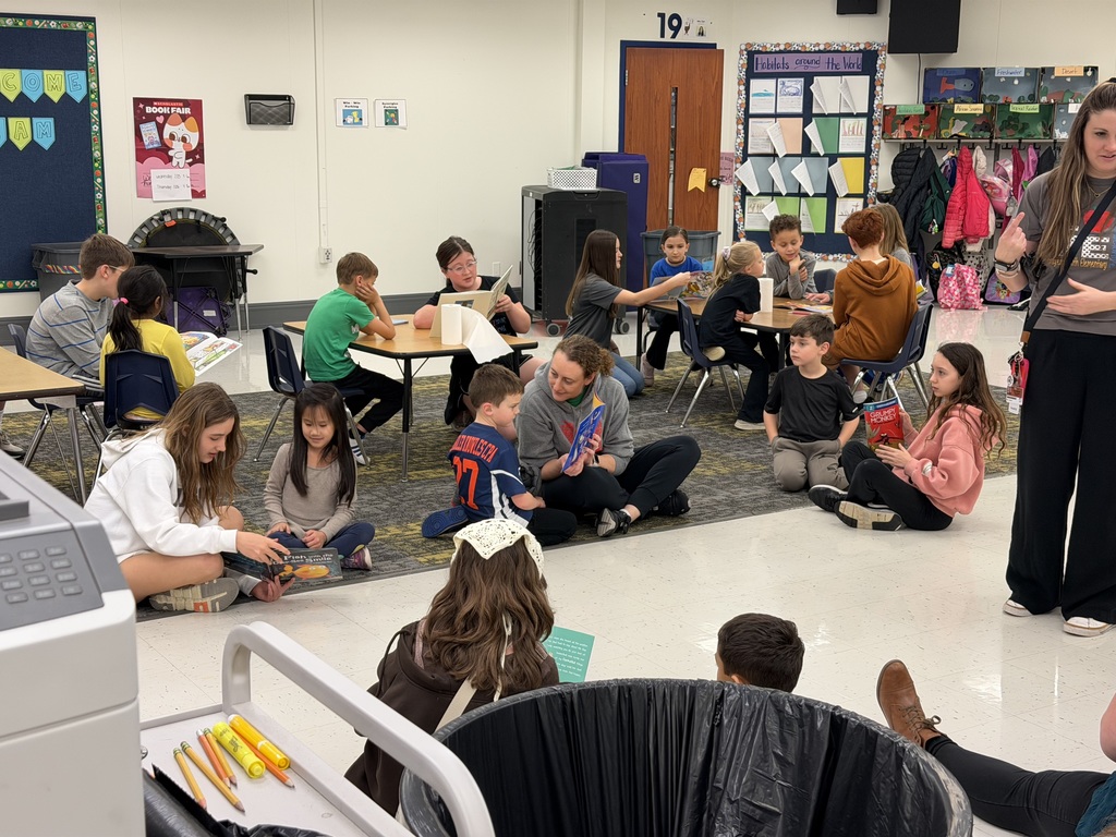 SMS Book Club reading to students at PSE