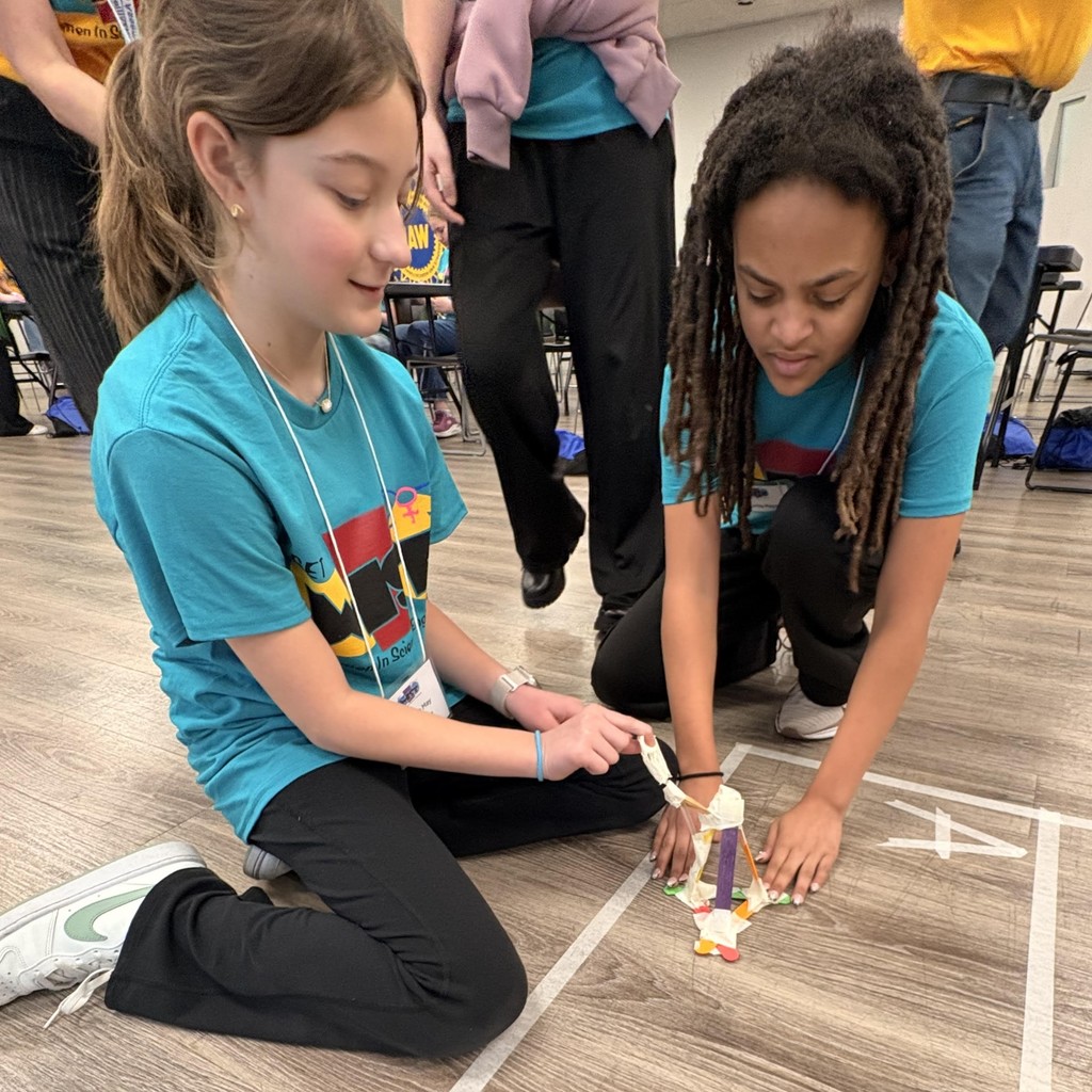 Team of 2 tests catapult with marshmallow