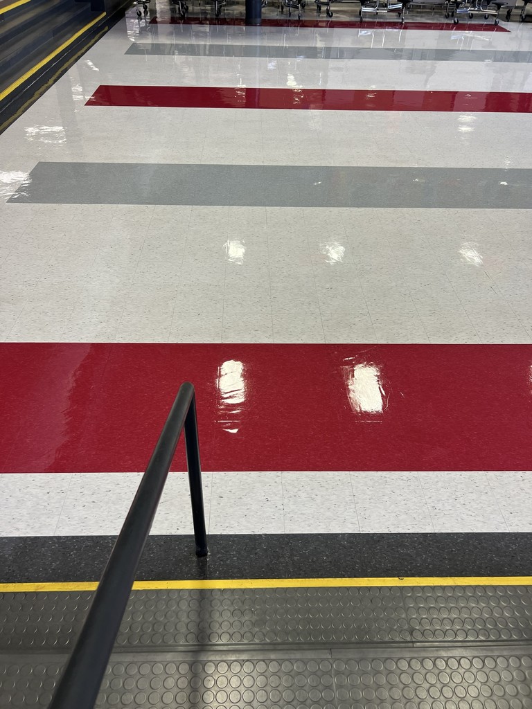 South High commons floor reflects lights above