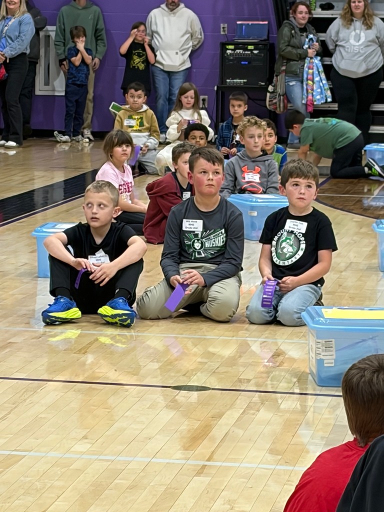 2nd-grade students creating their participation ribbons