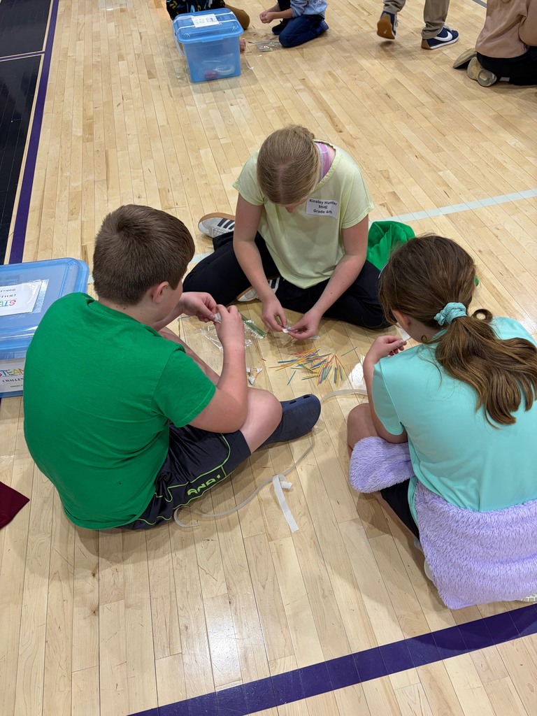 4th-grade students working on their STEAM Project