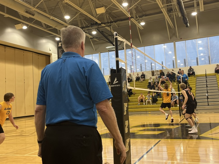 Luke Ahern setting a ball for his teammate