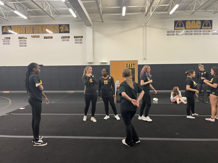 STUNT cheerleaders waiting to instruct their group