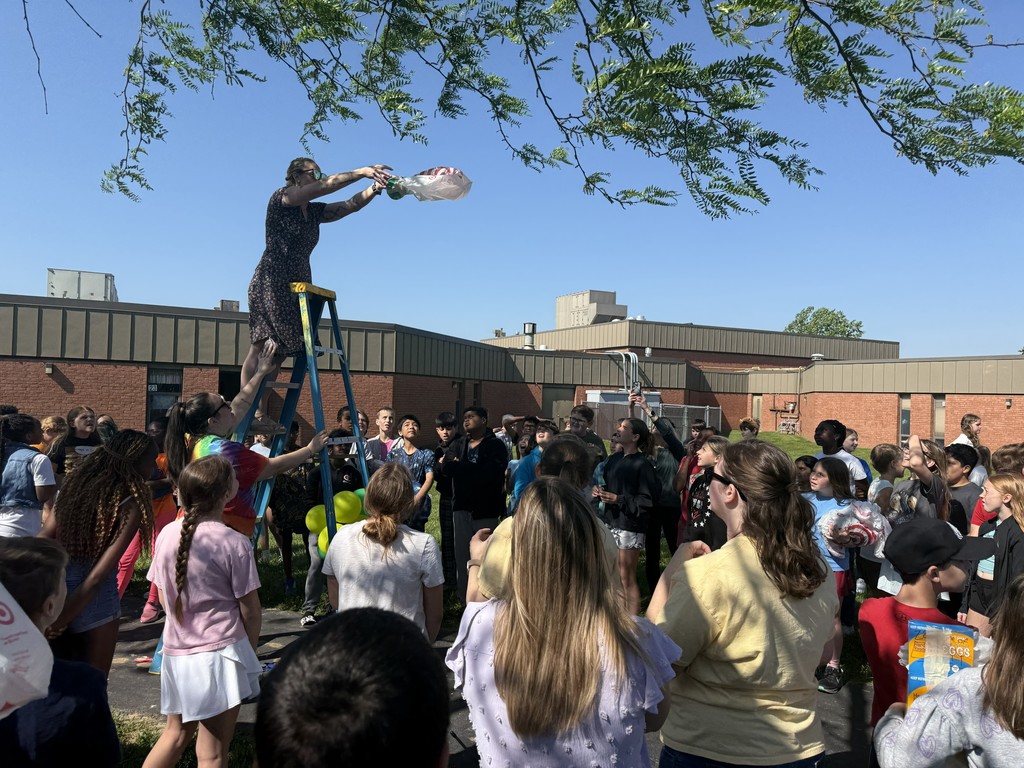 Teacher drops egg for an egg drop challenge
