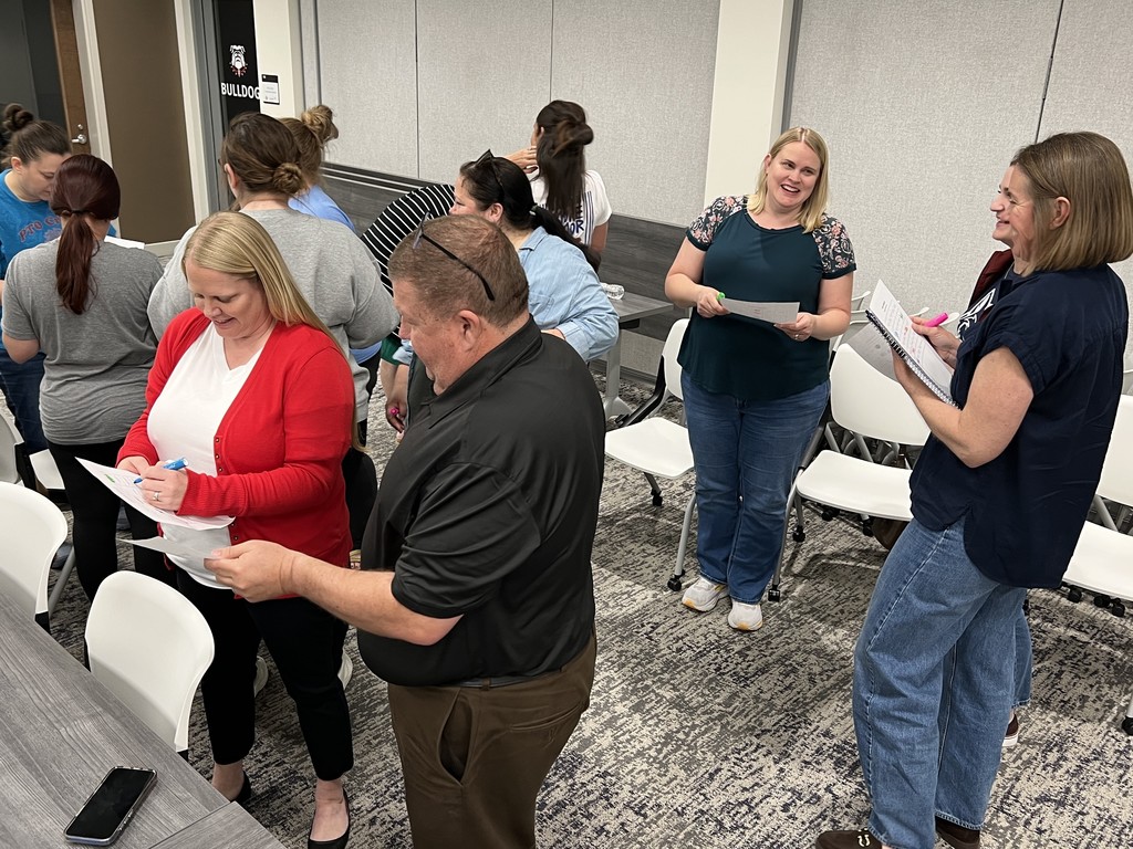 Parents play networking bingo