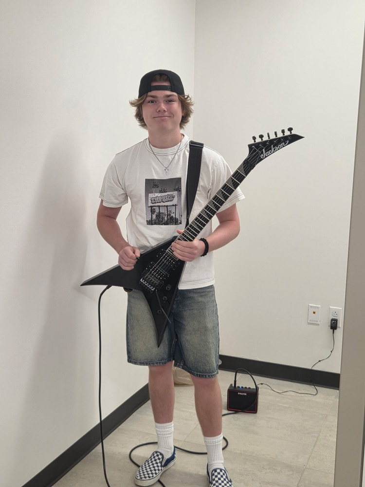 Logan and his guitar!