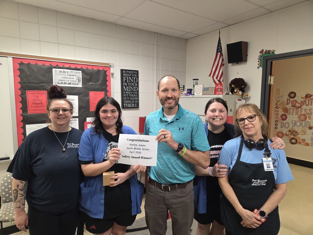 Natalie Adams receiving the Safety Award with Mr. Devlin and peers! 