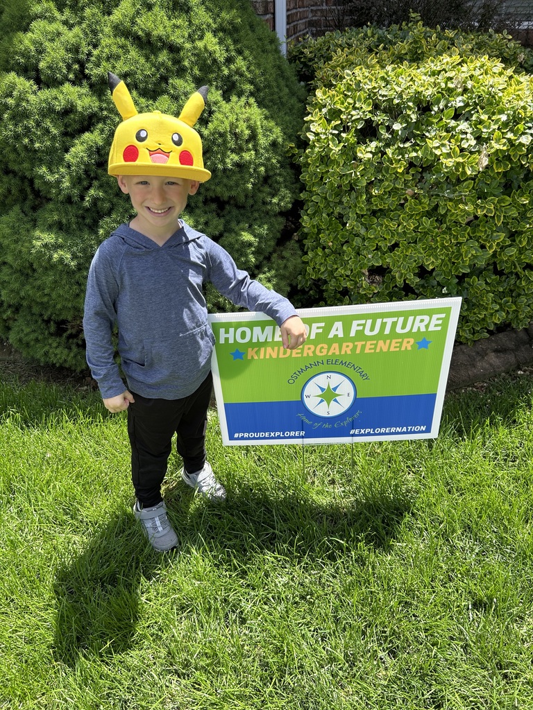 Future Explorer and his "Welcome to OES" yard sign.