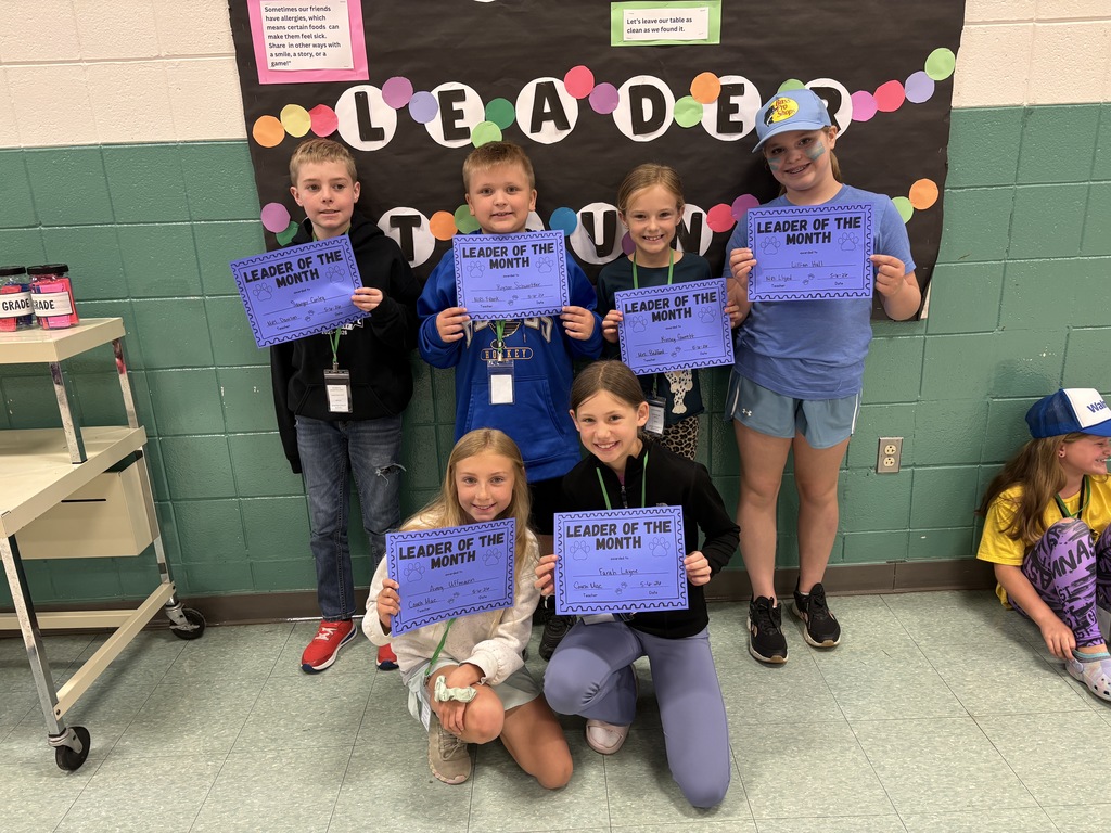 Students with their Specialist's Leader of the Month Awards