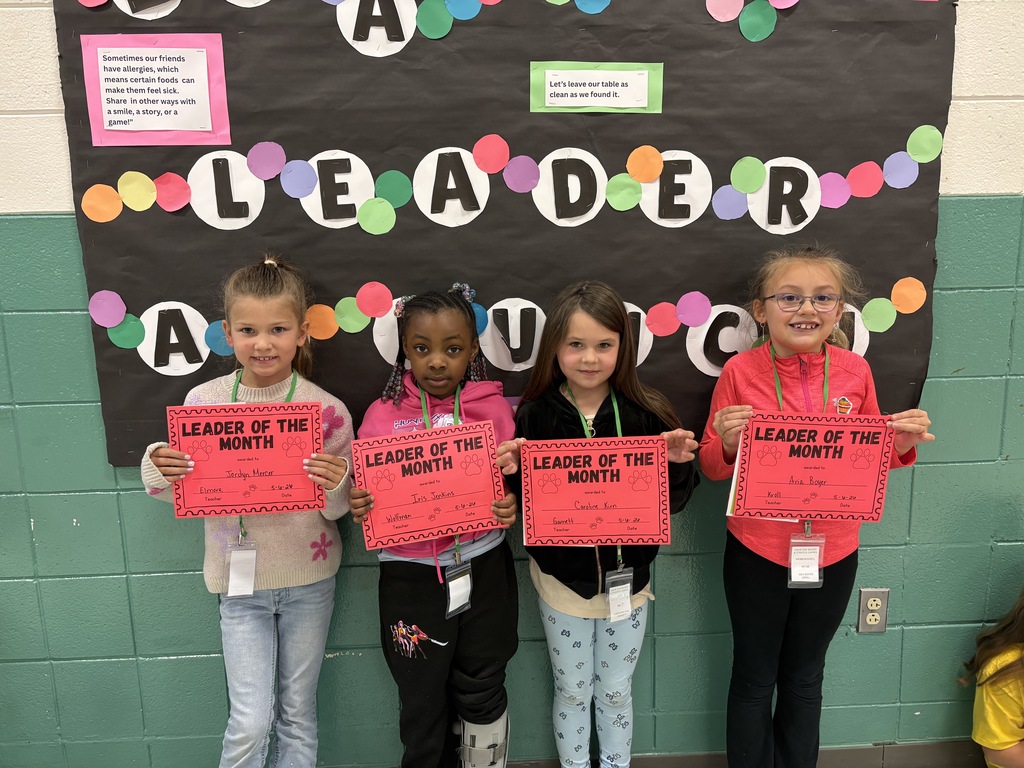 1st Grade students with their Leader of the Month Awards