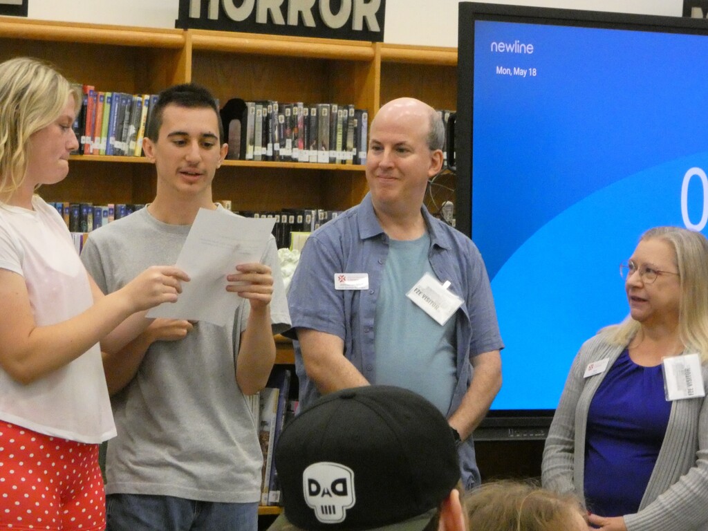 Student reads thank you message to business partner