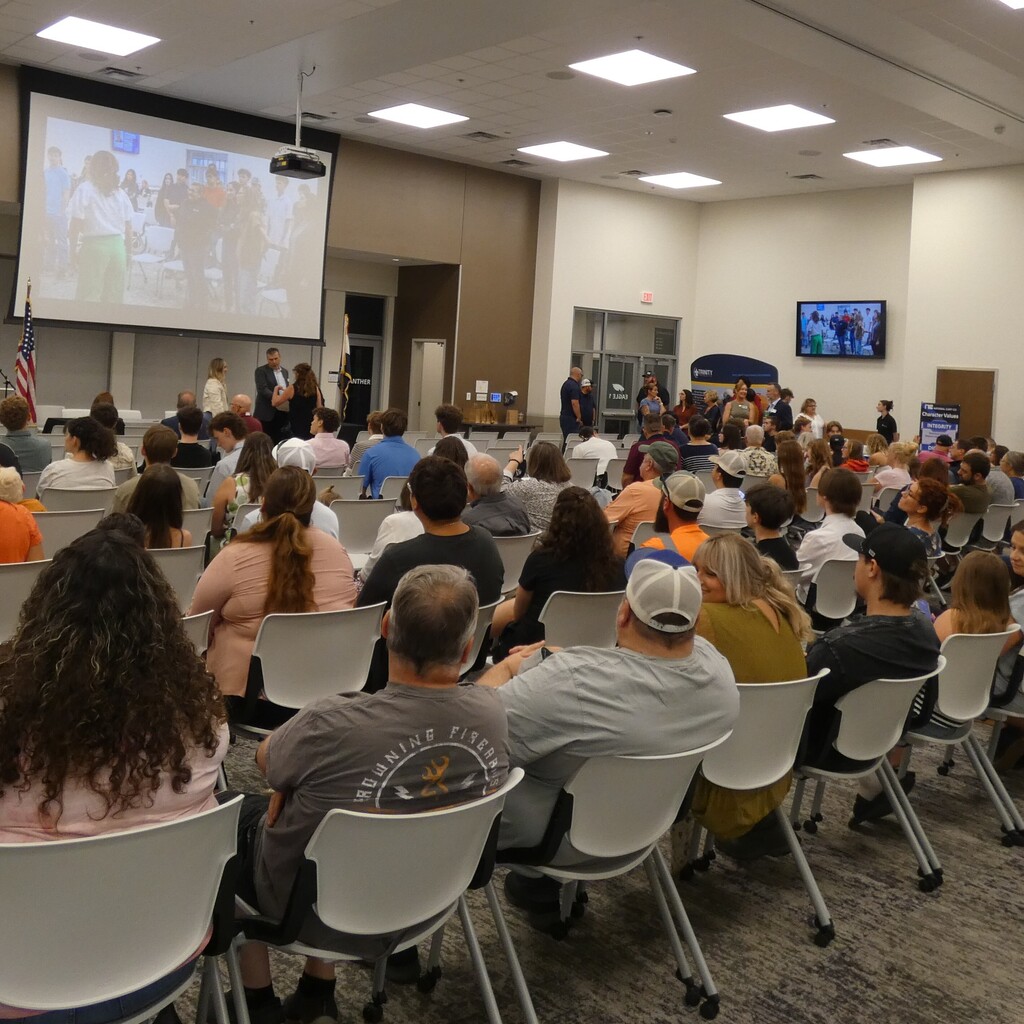 families gather to celebrate apprentices completing the program