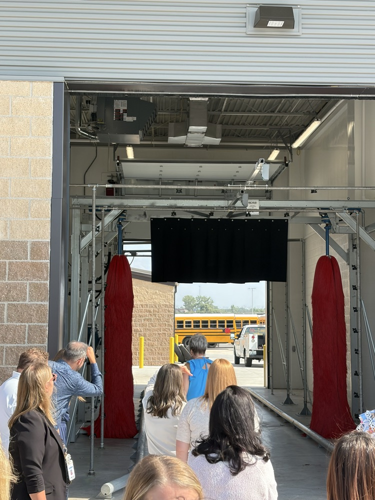 the bus washing station! a metalnpipe structure large enough for a bus to drive-through