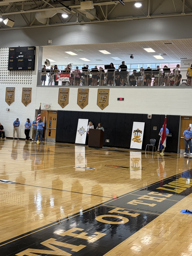pep rally! people speaking in a gym