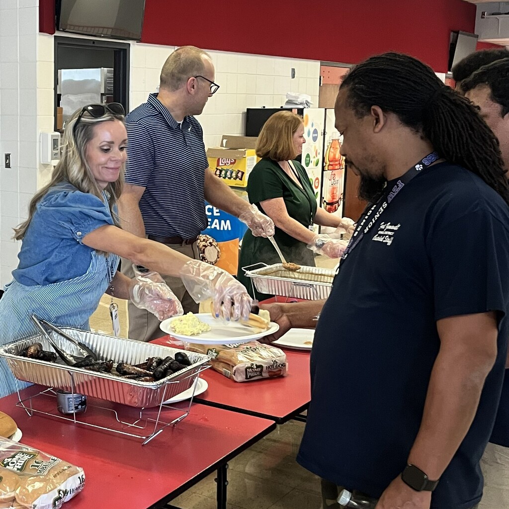 custodians are served a BBQ lunch buffet