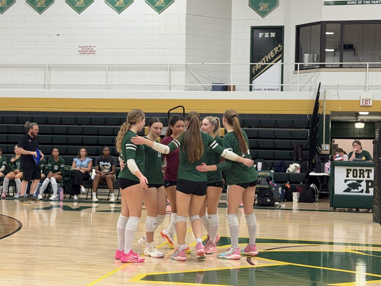 JV Volleyball Players Celebrating Point