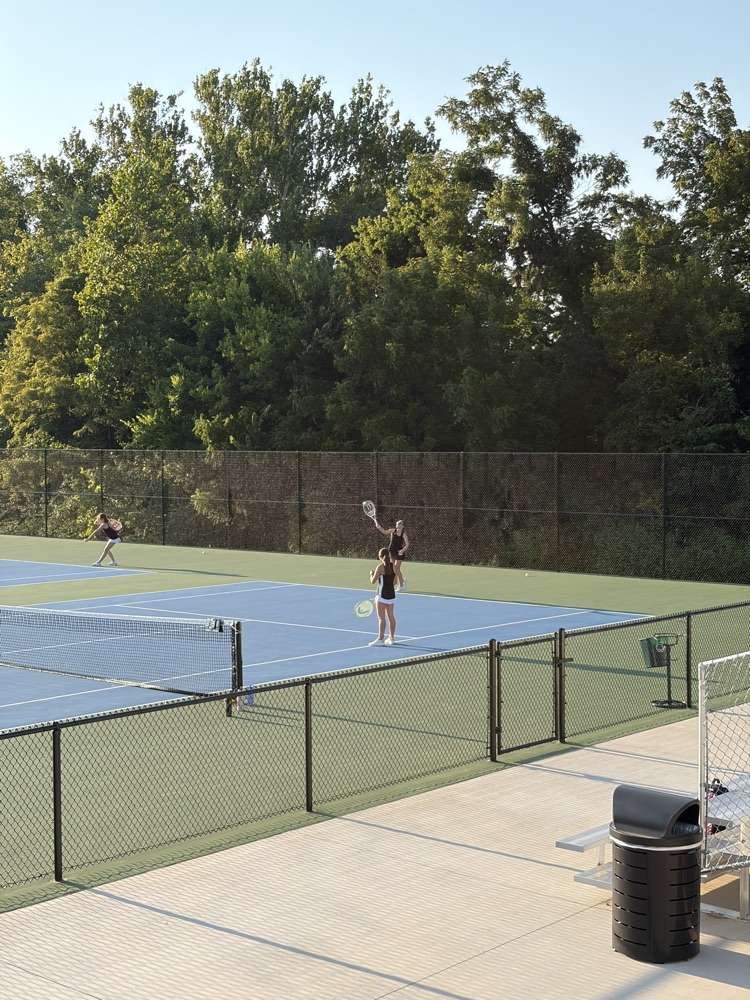 Our doubles team serving