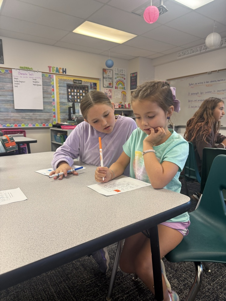 Mrs. Mills family working together during family time. 