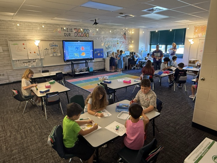Mrs. Haggin's family working together during family time. 