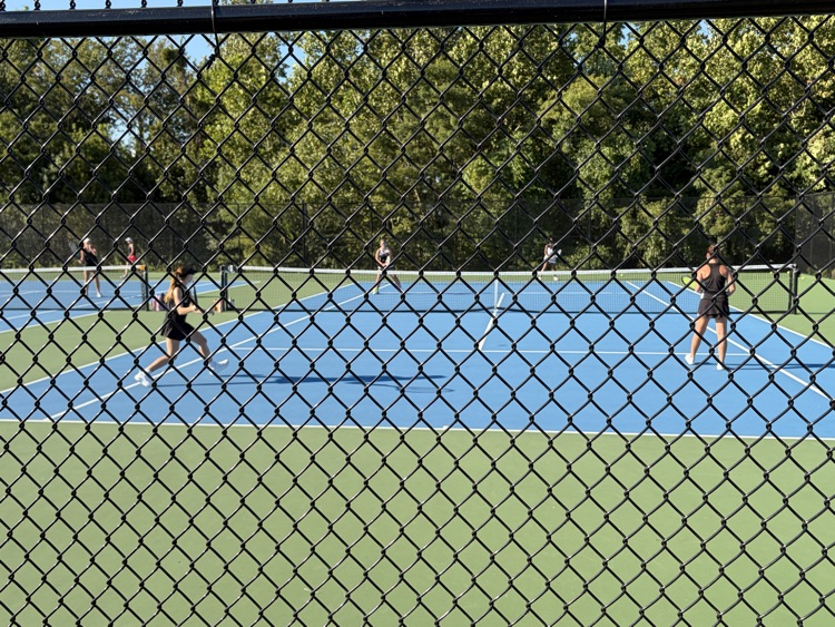 varsity doubles team 3 competing