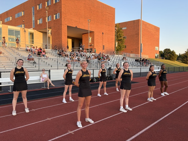 cheer team on the sidelines