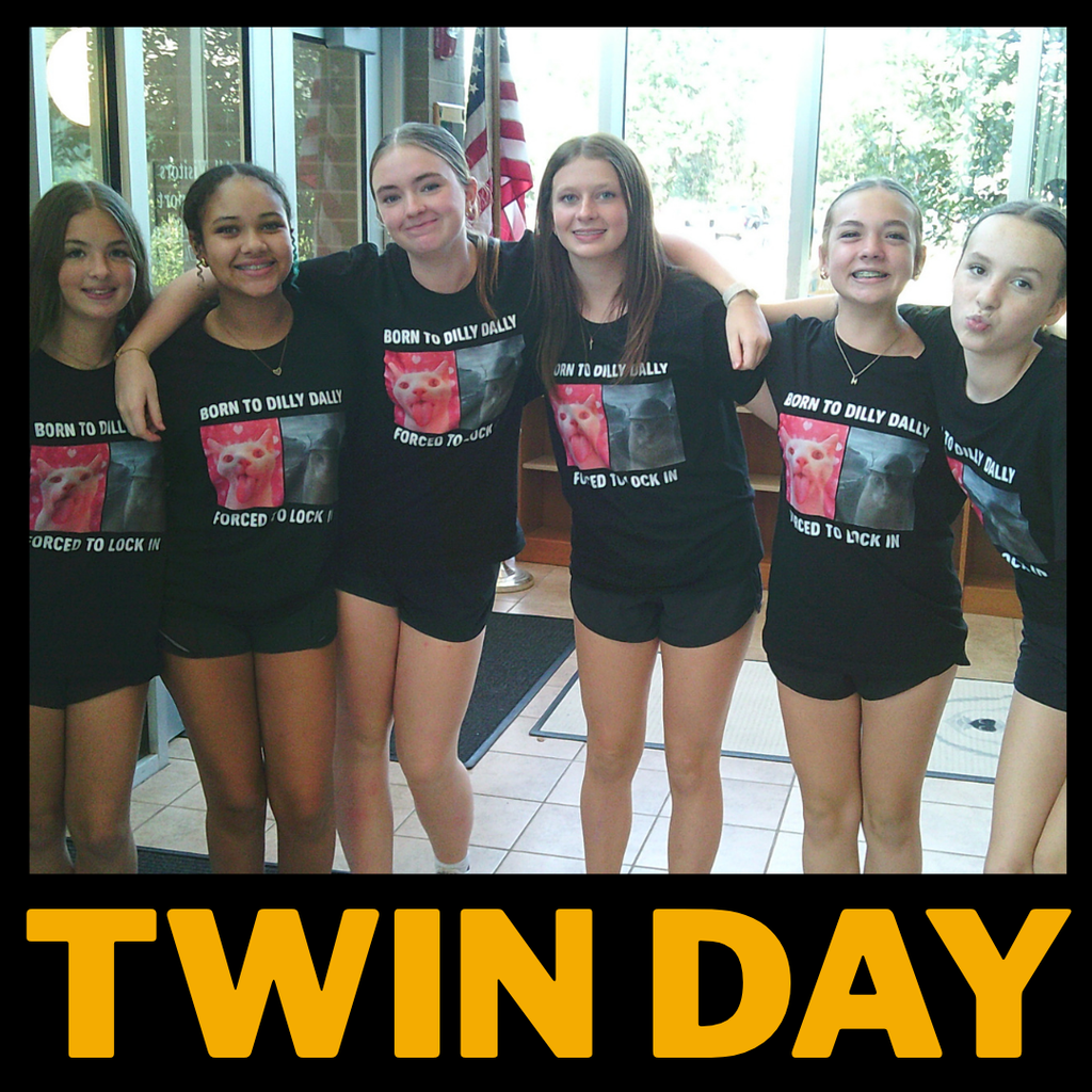group of 7th graders dressed the same for twin / group day