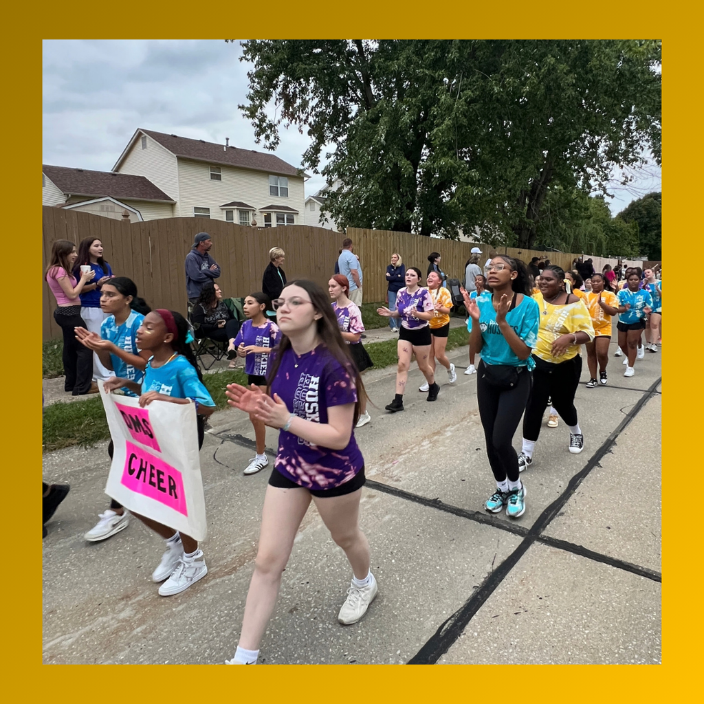 DMS cheer at hoco parade