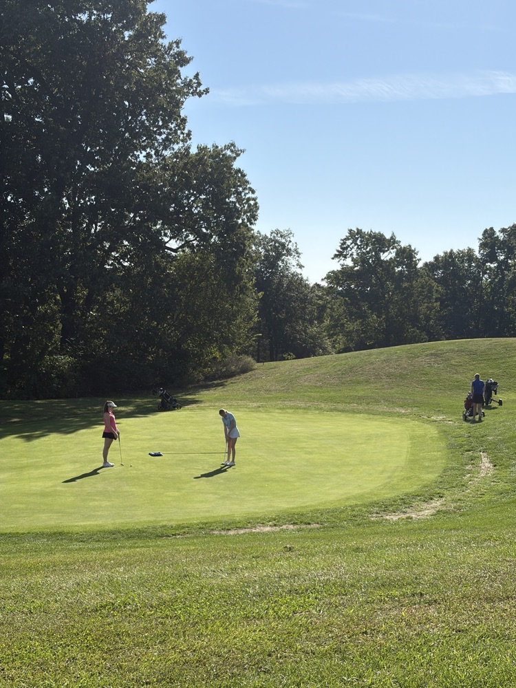 Brooklyn putting for four