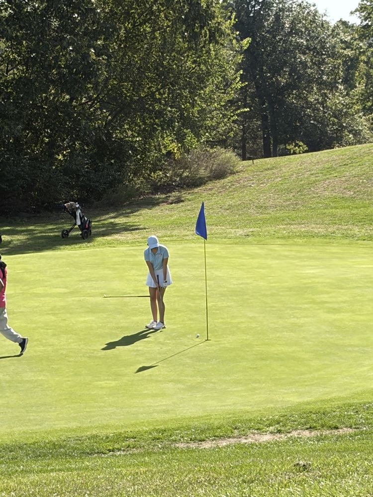 Andrea putting