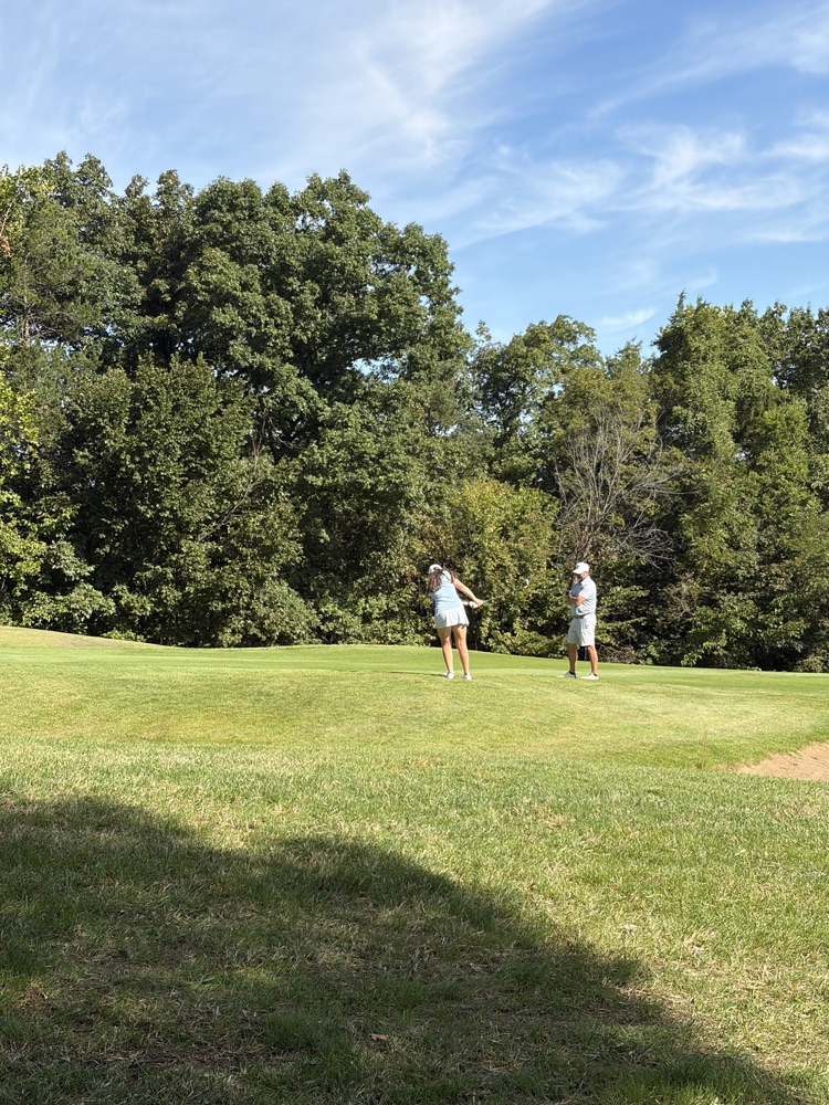 Erin pitching onto the green