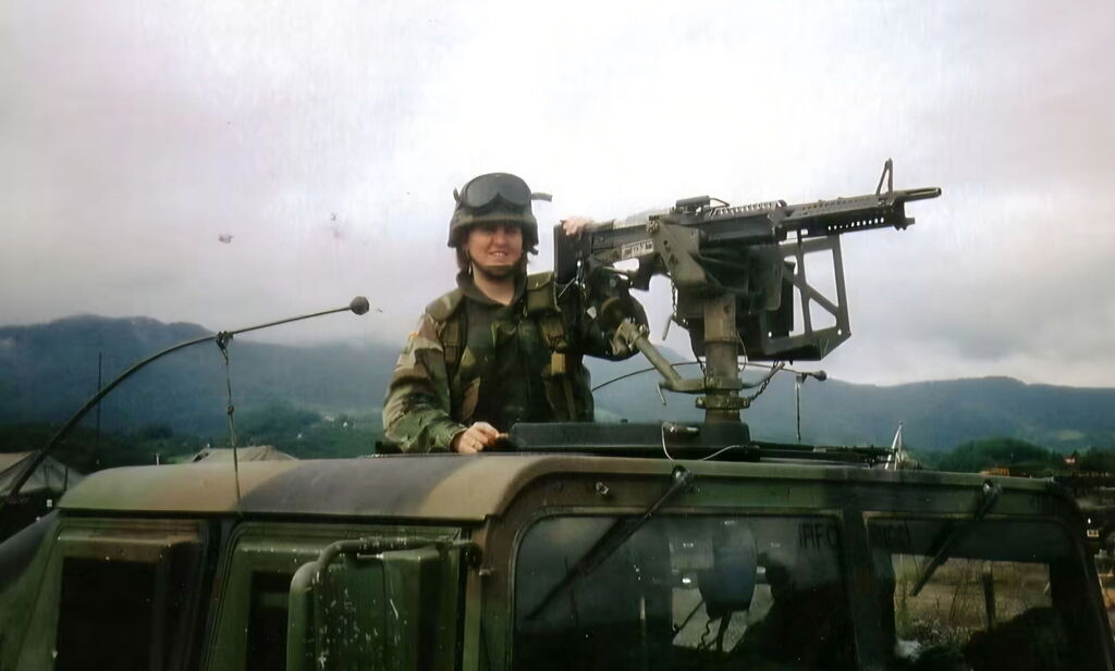 Tricia Derry Photo in hummer with machine gun mount.