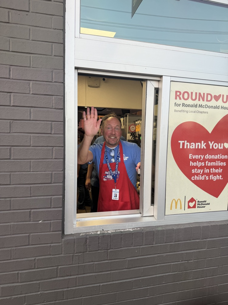 Dr Kraft waving through a McDonalds Drive Thru window!