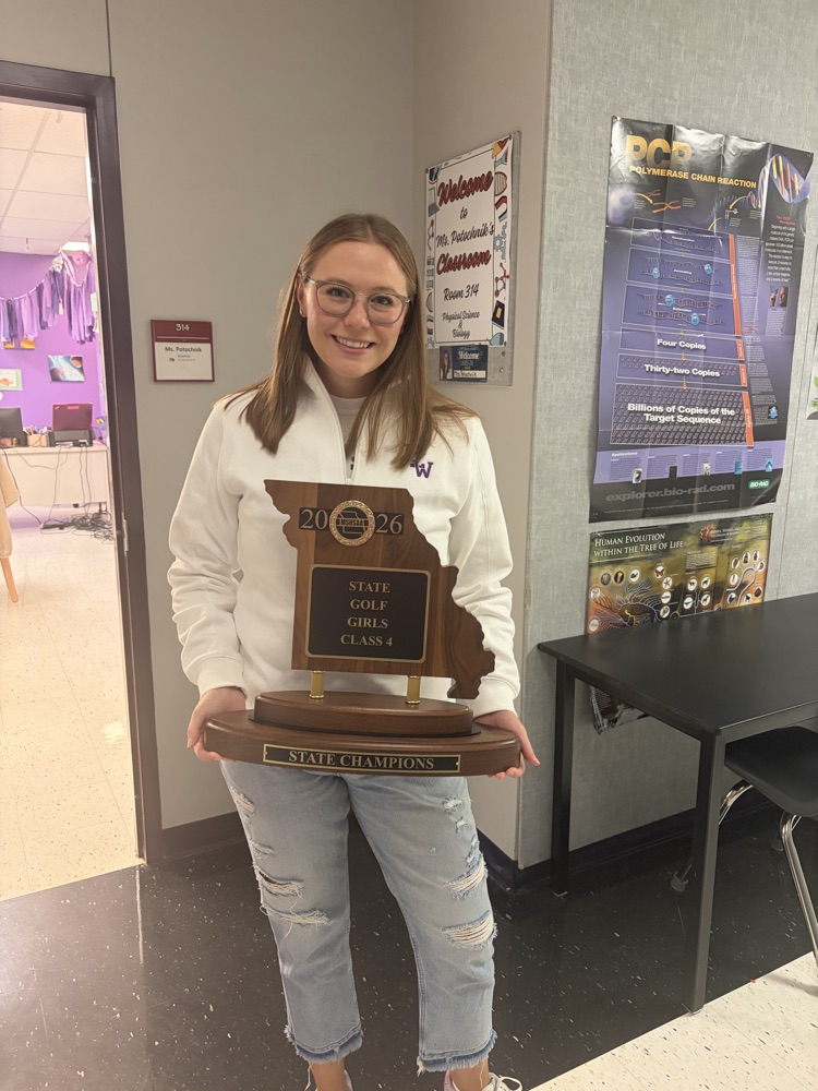 coach and trophy