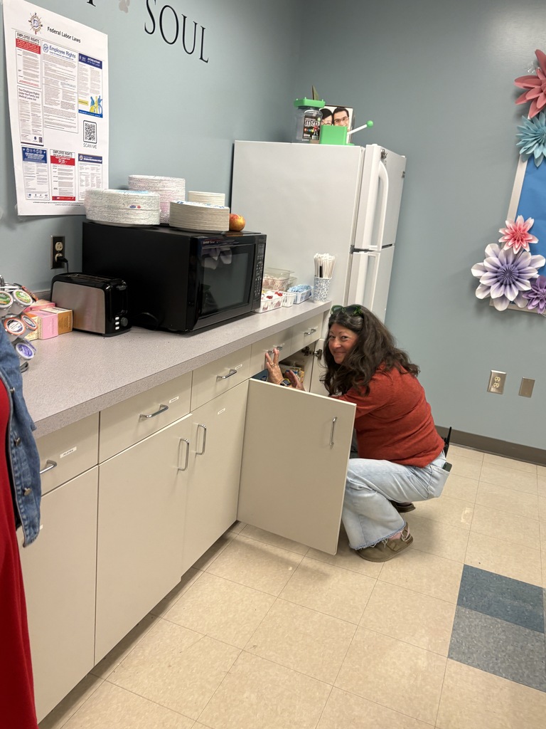 Teachers searching for apples on Apple Day