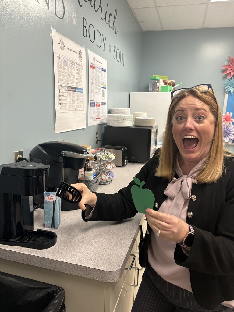 Teachers searching for apples on Apple Day