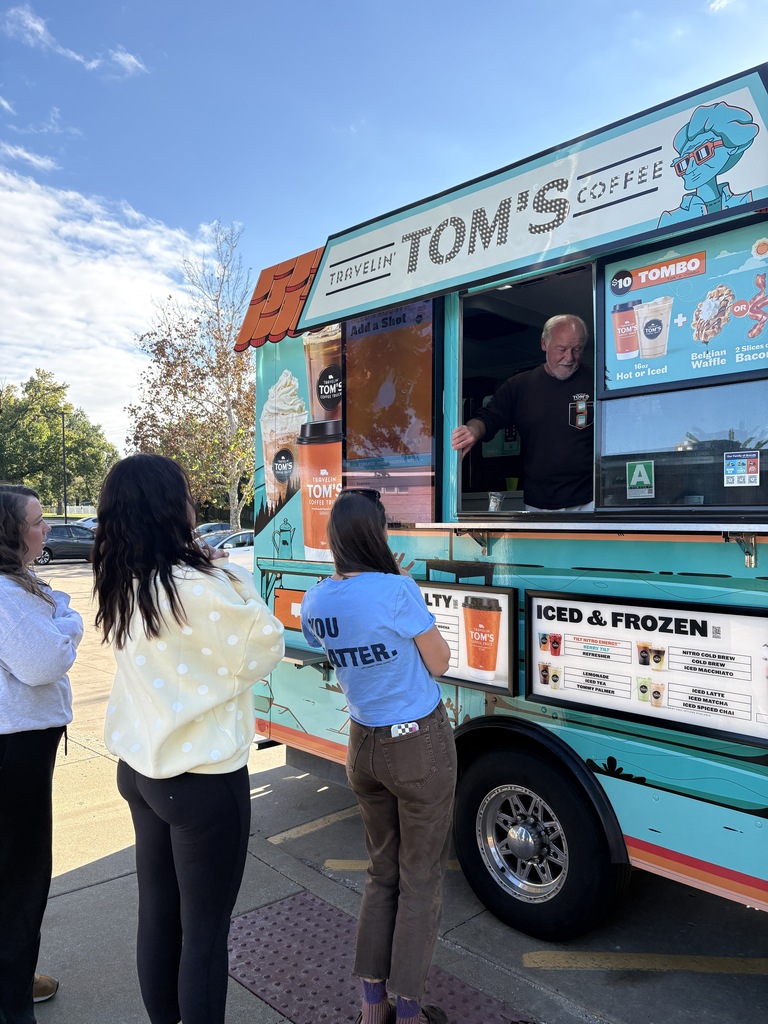 Teachers lining up at a coffee truck.