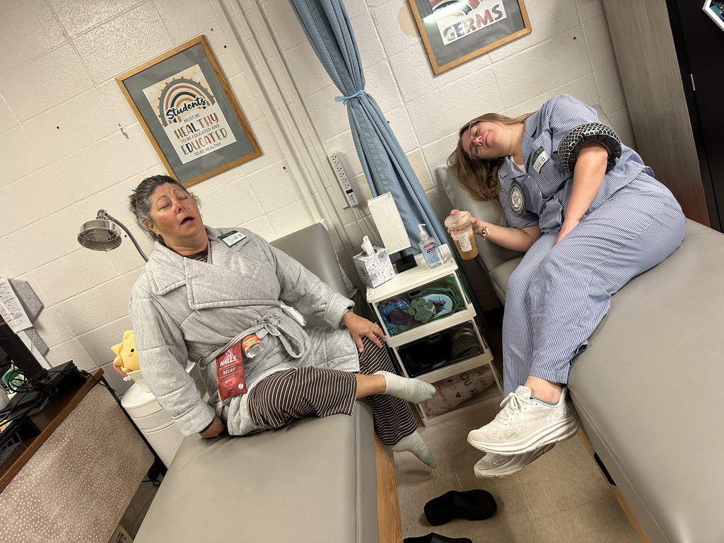 Two teachers dressed up as a sick day.