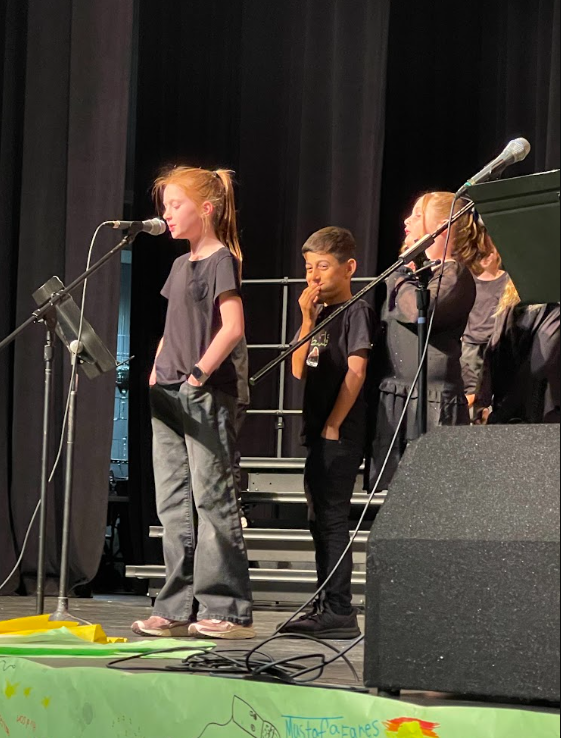 Students singing in their 4th grade musical.