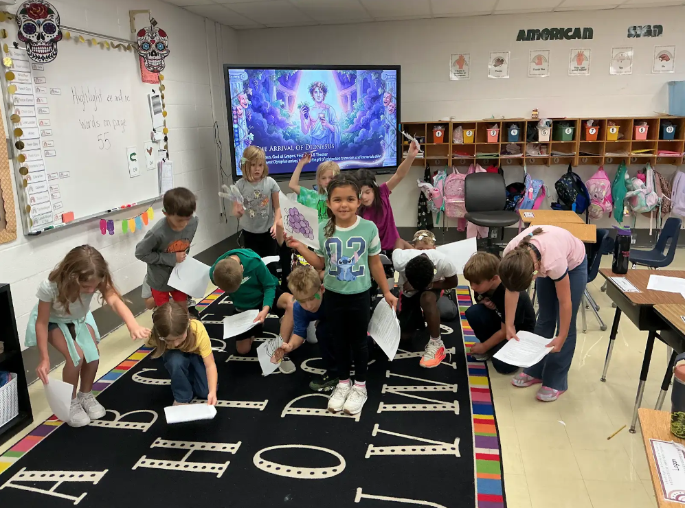 Students learning about Ancient Greece in a classroom.