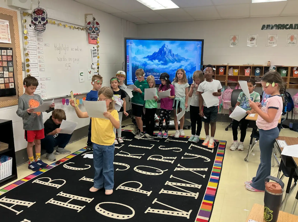 Students learning about Ancient Greece in a classroom.