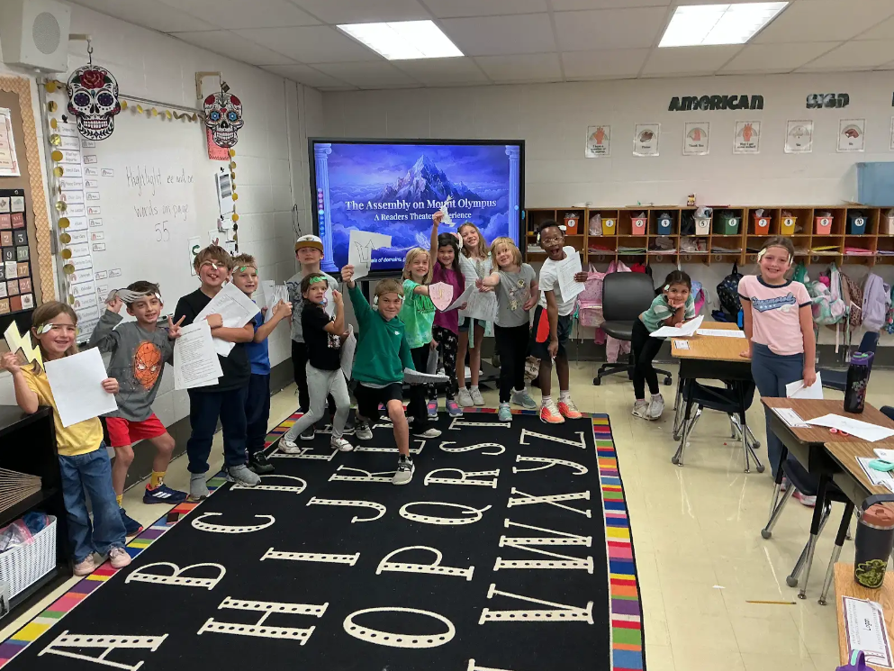 Students learning about Ancient Greece in a classroom.