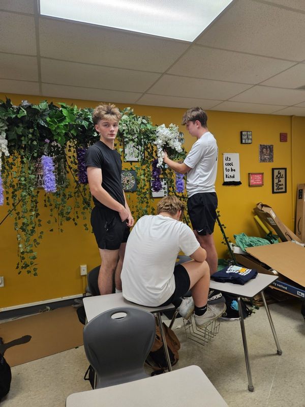 Student council members decorating for the dance