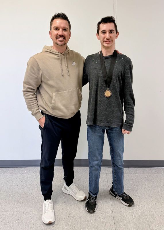 Mr. Loutzenhiser pictured with award recipient, Dominic Ernst