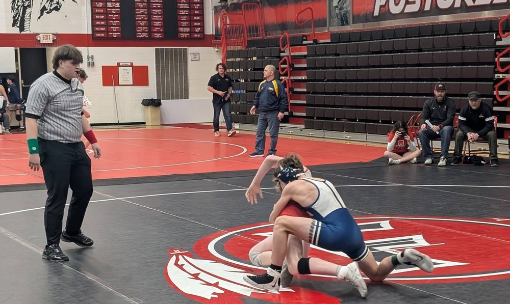 Senior, Blake Hernandez, officiating his first wrestling match
