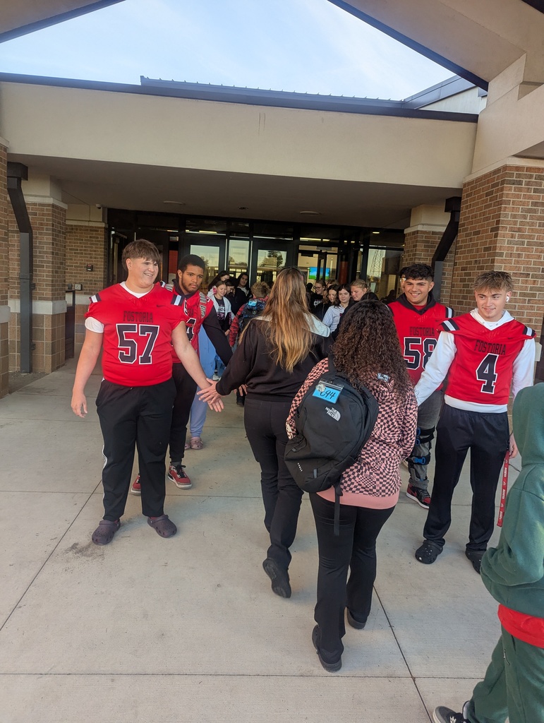 FJSHS students greet FES students in the morning
