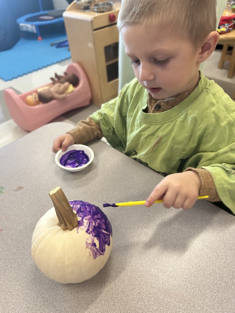 Mrs. Boiros' AM class painting pumpkins 