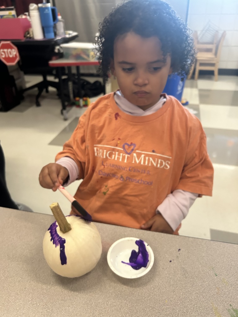 Mrs. Boiros' AM class painting pumpkins