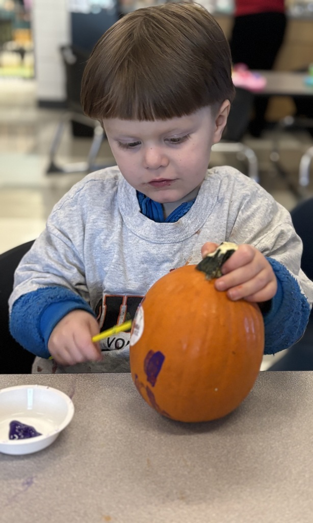Mrs. Boiros' AM class painting pumpkins
